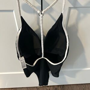 Elegant Black and White One Piece Swimsuit with Zipper Detail